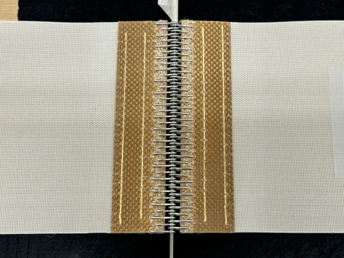 金具レーシング法