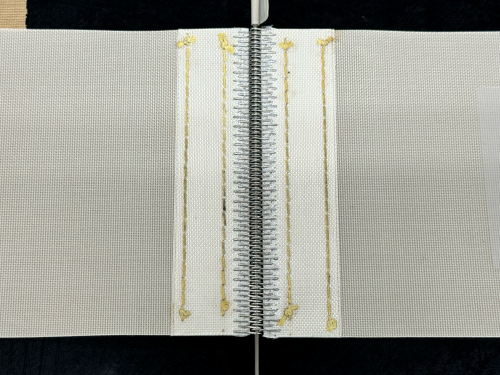 金具レーシング法